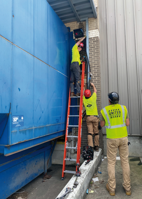 United Door and Dock Crew Members Working on Commercial Project