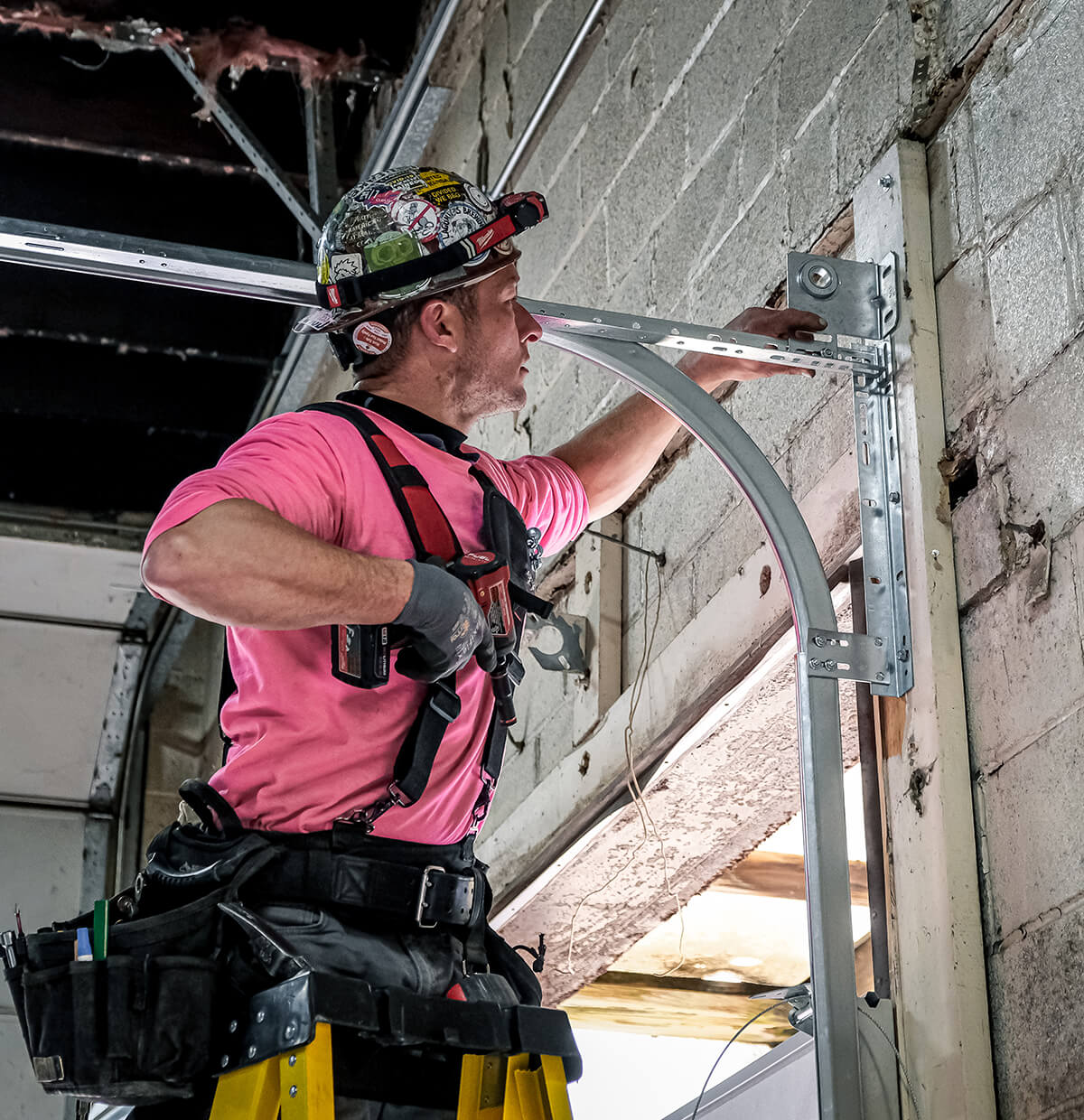 United Door and Dock Crew Member Working on Overhead Door