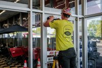 United Door and Dock Technician Working on ADA Storefront Doors