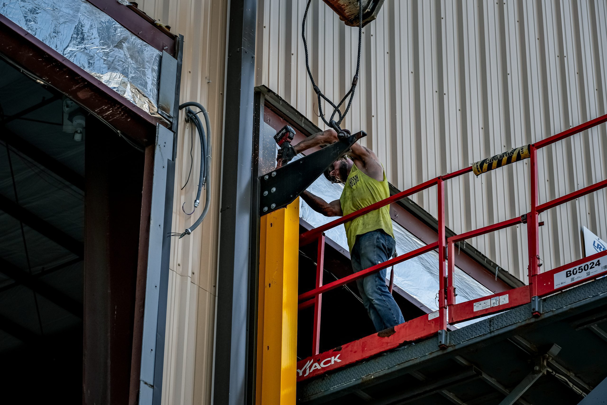 United Door and Dock Technician Removing Rubber Doors